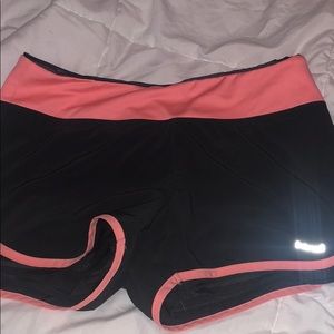 Peach and gray athletic shorts with spandex